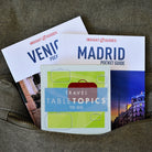 TableTopics Travel To Go conversation card set with two travel guides in a backpack pocket