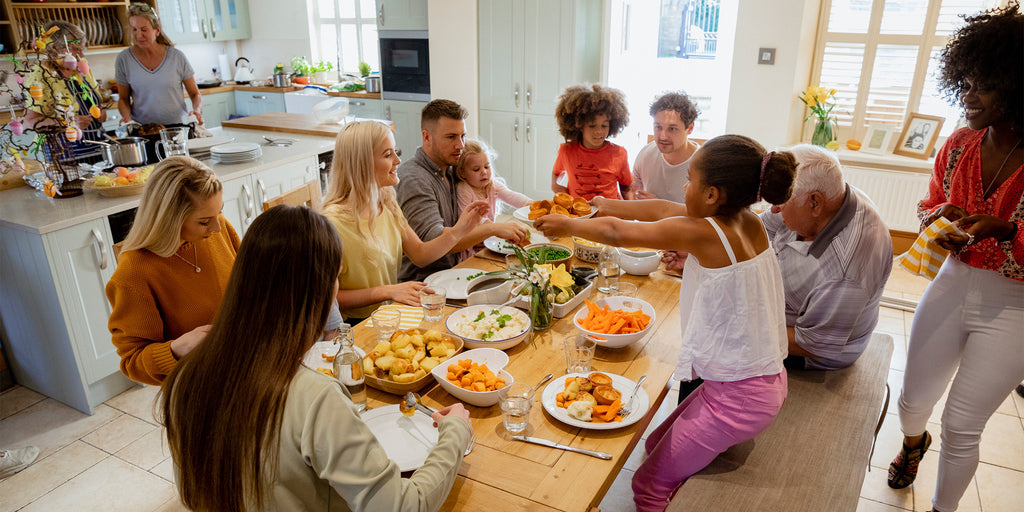 Large family enjoying meal together at home